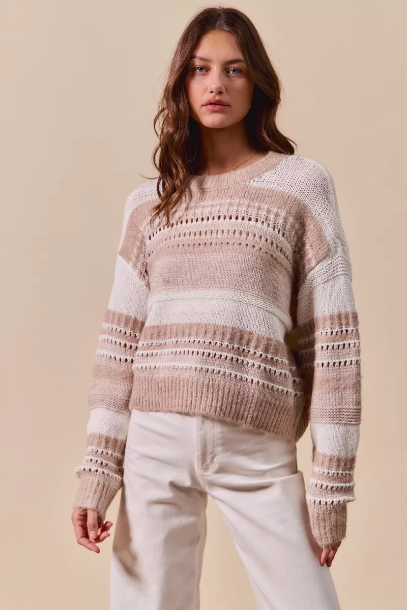 Sandstone Striped Open Knit Sweater in soft taupe and ivory with long sleeves and textured openwork stitching, front view.
