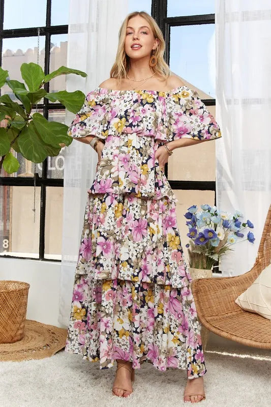 Full length view of feminine floral tiered maxi dress
