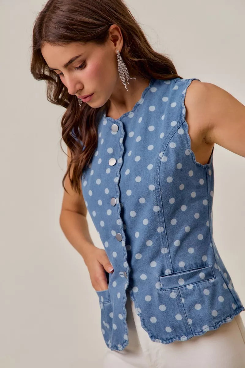 Side view of light wash denim polka dot vest top
