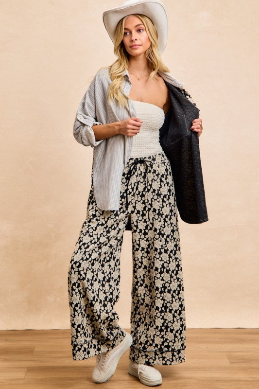Florence Mixed Print Button Down Shirt with cream floral print, gray striped panels and contrasting chest pocket, styled with matching floral pants.