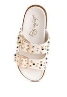 Top view of white slide sandal with studded detailing and gold hardware, branded insole