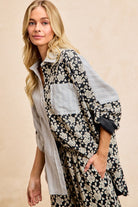 Florence floral and striped button down shirt with rolled sleeve and oversized relaxed silhouette.