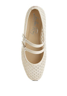 Top view of beige raffia ballet flats, highlighting the almond toe and double strap design.