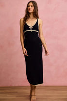 Modern Black with ivory piping  sleeveless bodycon maxi dress crafted from soft knit sweater fabric in 100% cotton front view