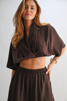 Cropped front view of chocolate lounge set showing soft shawl neckline and relaxed sleeves.