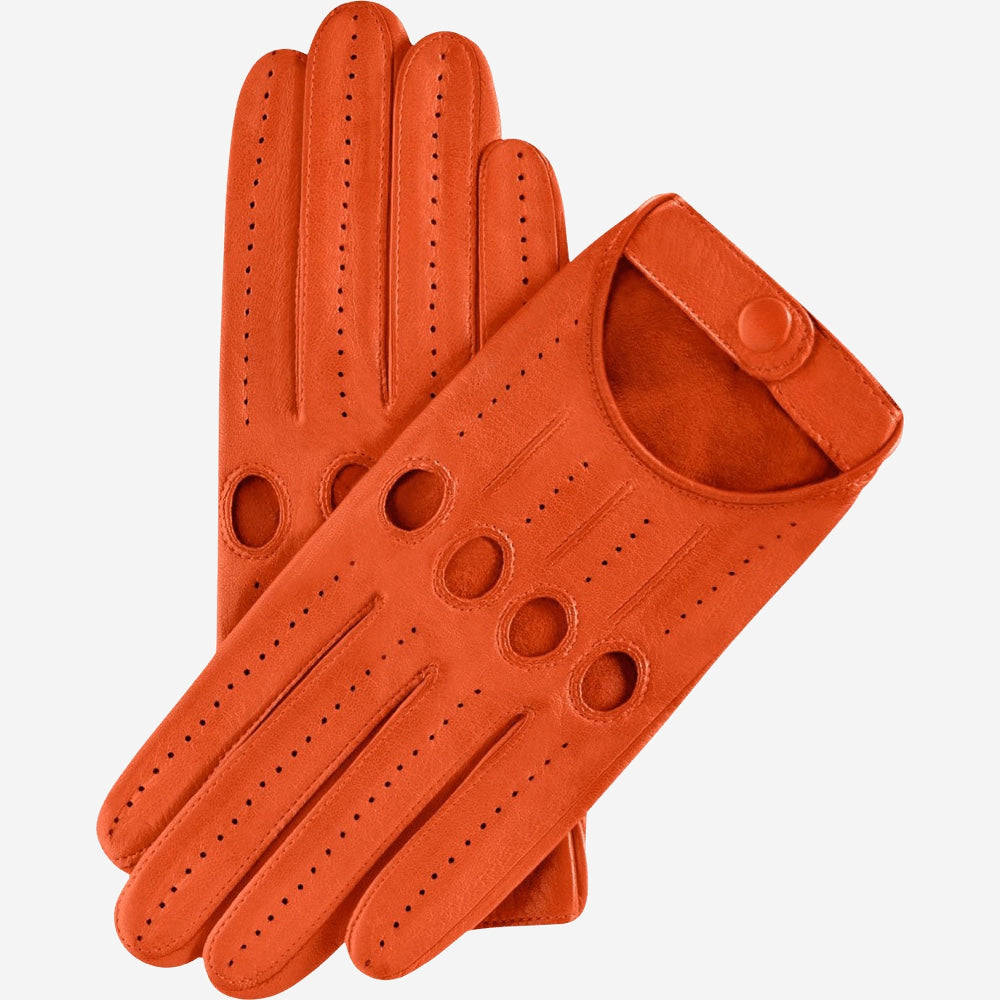 Pair of orange leather driving gloves on a white background