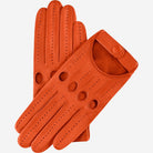 Pair of orange leather driving gloves on a white background