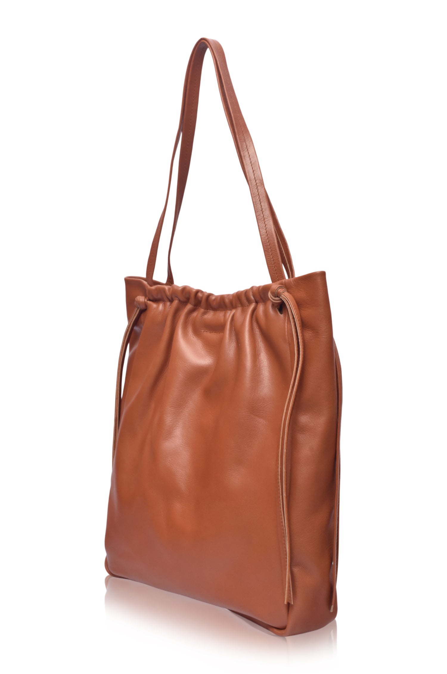 Side profile of the Alessia Leather Tote Bag in vintage camel showing slim shoulder straps