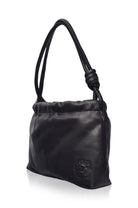 Black leather handbag with a knotted handle on a white background