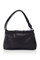 Black mini leather handbag on a white background, front view