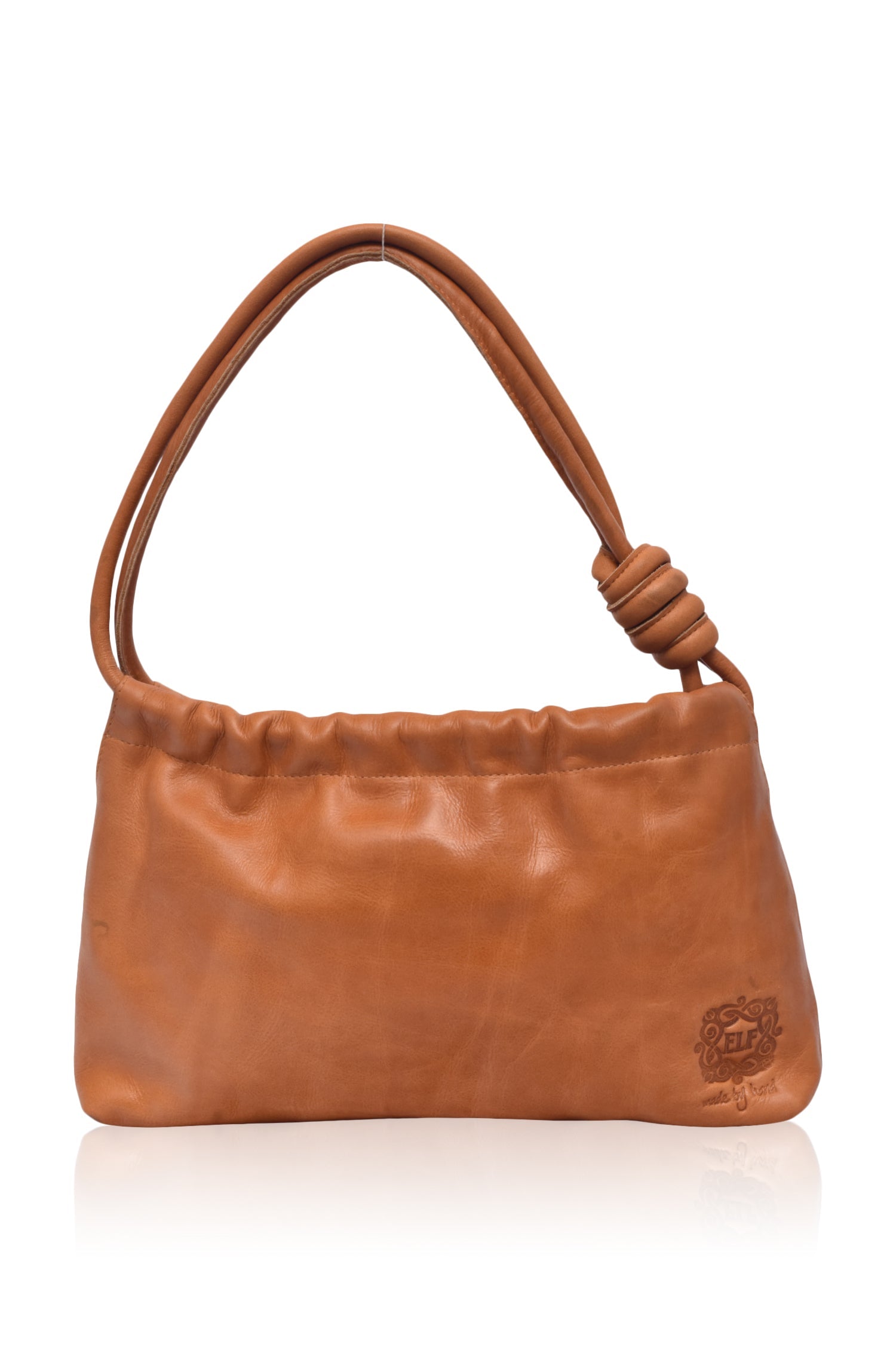 Tan leather handbag with a knotted handle on a white background