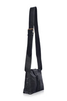 Black leather crossbody bag on a white background