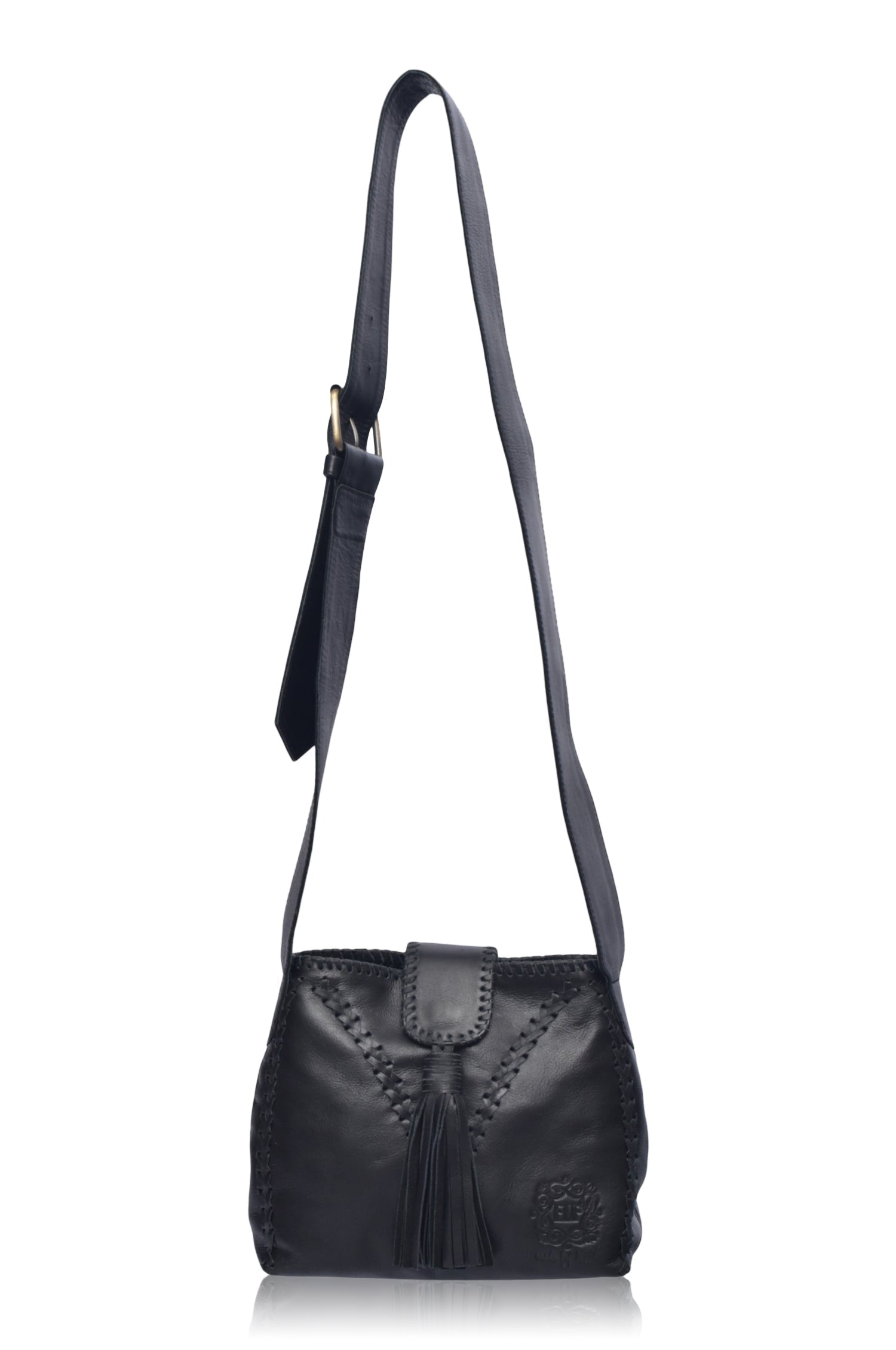 A black leather handbag with fringe details and wide crossbody strap on a white background, front view