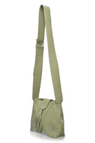 Olive Green leather handbag with a strap on a white background