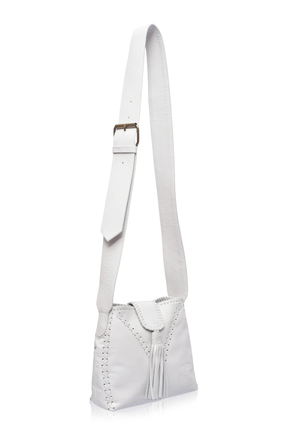 A white leather shoulder bag with a long strap, a front flap, and a tassel detail, shown on a plain white background.