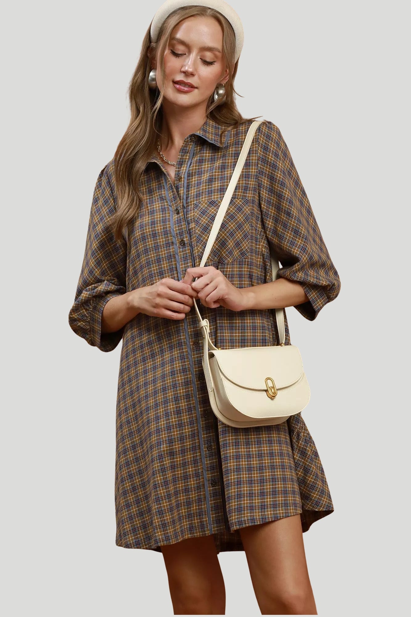 Autumn Row Plaid Shirt Dress in brown multi plaid with button front, three quarter sleeves and cream crossbody bag.