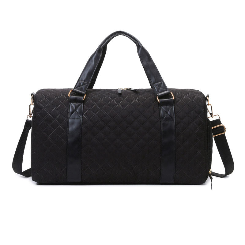 AVAH-Weekend Bliss Quilted Travel Bag in black featuring a timeless design with vegan leather accents, Exterior open side pocket, luggage/trolley sleeve, shoe compartment, zip pocket and gold hardware