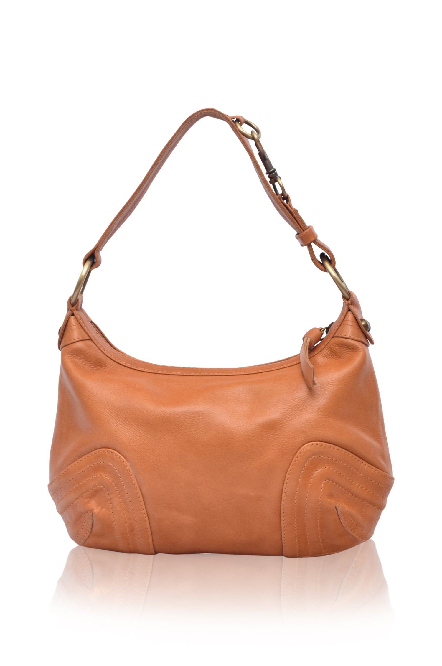 Tan leather handbag on a white background