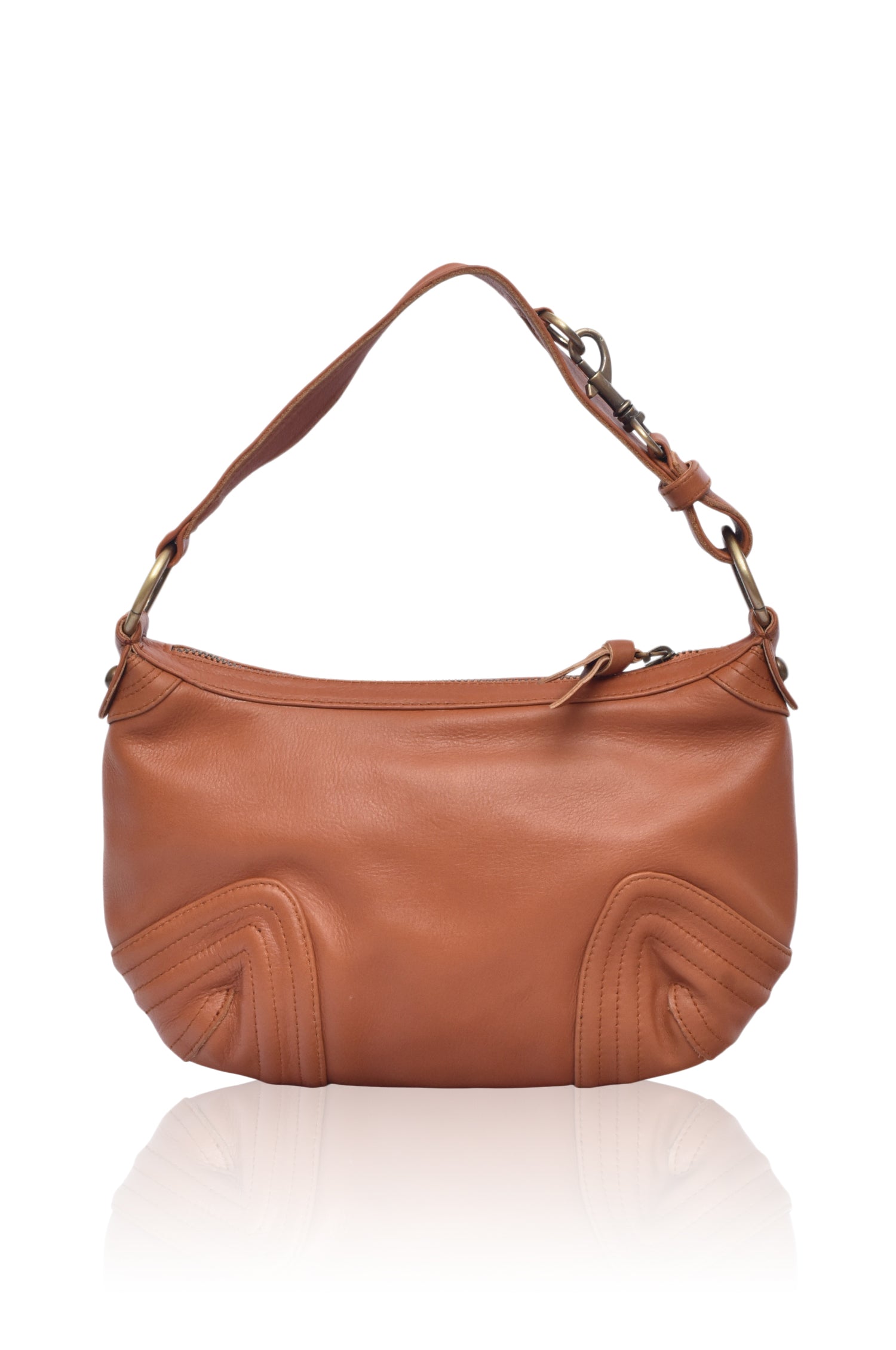 Camel leather handbag with short handle, hardware accents zipper top on a white background