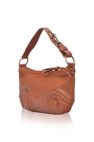 Camel leather handbag on a white background