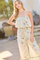 Front view of sage strapless bohemian jumpsuit with flounce bodice and tassel tie waist-AVAH