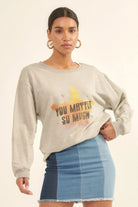 Model wearing Radiance Reminder Graphic Sweatshirt with uplifting “You Matter So Much” graphic star print-AVAH