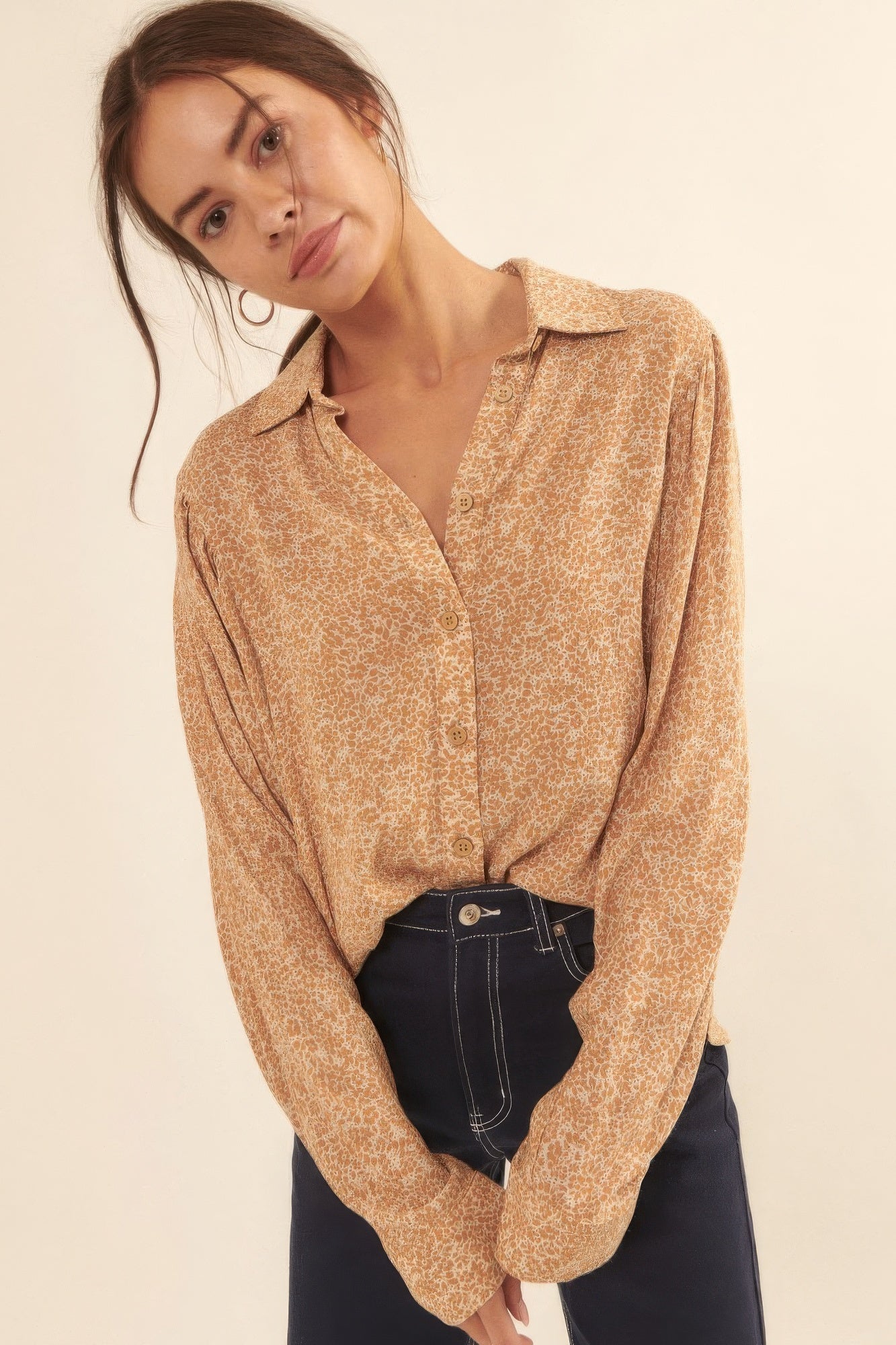 Close-up of button-up golden floral blouse with relaxed drape-AVAH