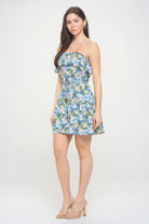 Side angle of blue floral tie waist mini dress