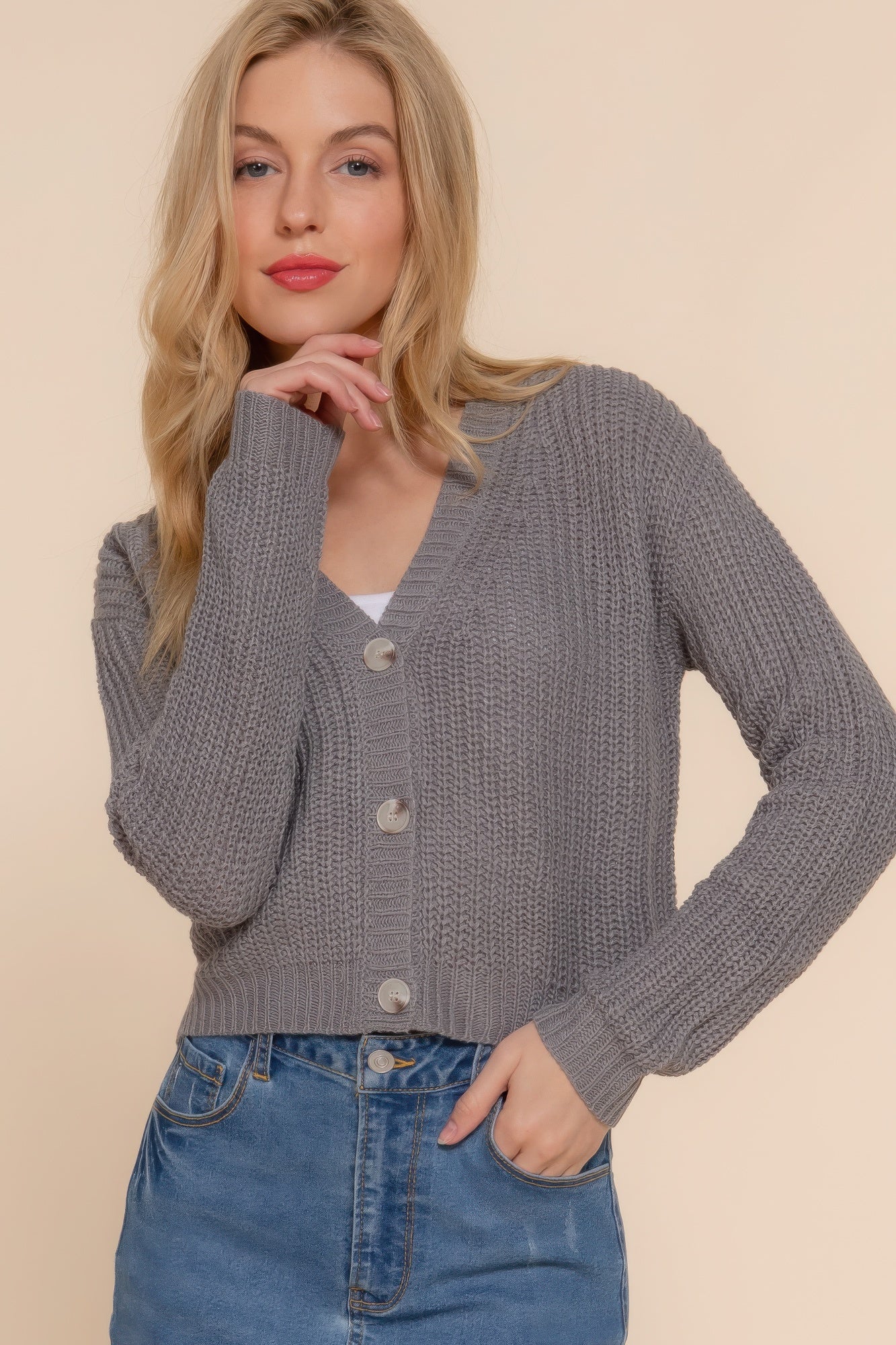 Model wearing cropped gray cardigan with button-front closure and V-neckline-AVAH