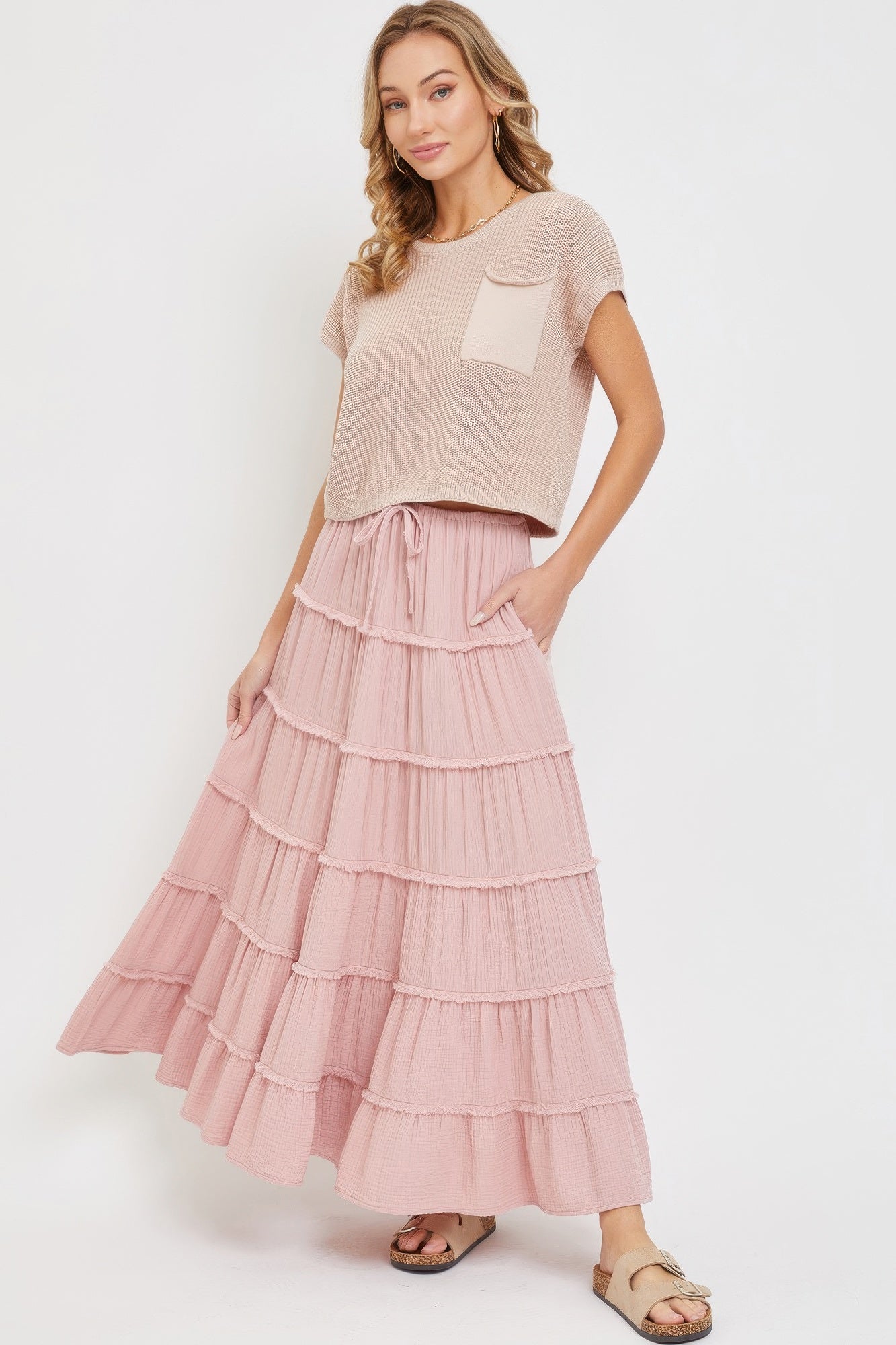 Blush tiered maxi skirt styled with neutral knit top full outfit

