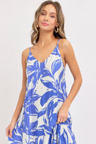 Close up of blue floral v neckline and thin straps