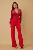 Red wrap front long sleeve jumpsuit with tie waist full length view
