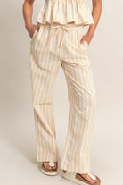 cream striped wide leg pants drawstring waist detail