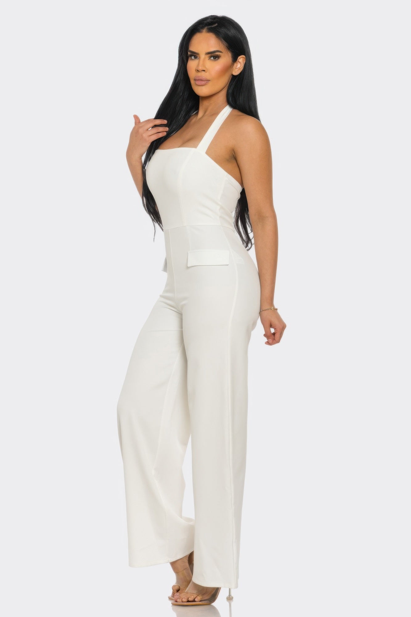 off white halter wide leg jumpsuit with tailored waist and wide leg silhouette, side view