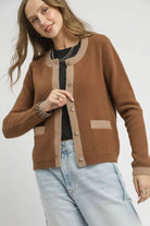 Camille Contrast Trim Knit Cardigan in latte brown with beige trim, decorative gold tone buttons and front patch pockets.