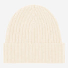 Ivory knit beanie on a light gray background