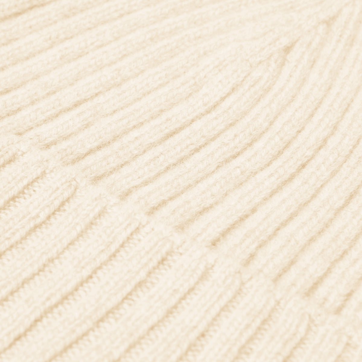 Close-up of ivory cashmere yarn texture