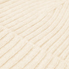 Close-up of ivory cashmere yarn texture