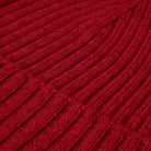 Close-up of red yarn with a textured pattern