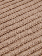 Close-up of a textured brown cashmere  knit surface