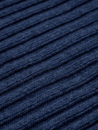 Close-up of blue textured cashmere  fabric with horizontal lines