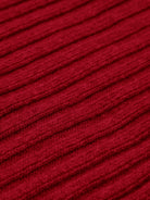 Close-up of red cashmere knit textured fabric