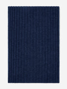 Navy blue knitted cashmere scarf on a white background