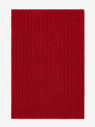 Red folded cashmere scarf on a white background