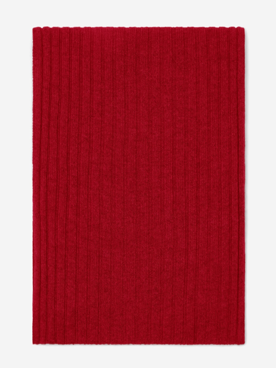 Red folded cashmere scarf on a white background