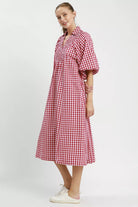  Side view of crimson gingham puff sleeve midi dress with smocked bodice and full skirt, AVAH