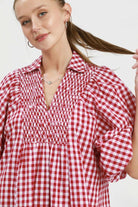 Close detail of smocked bodice on Cherry Check Gingham Midi Dress, AVAH
