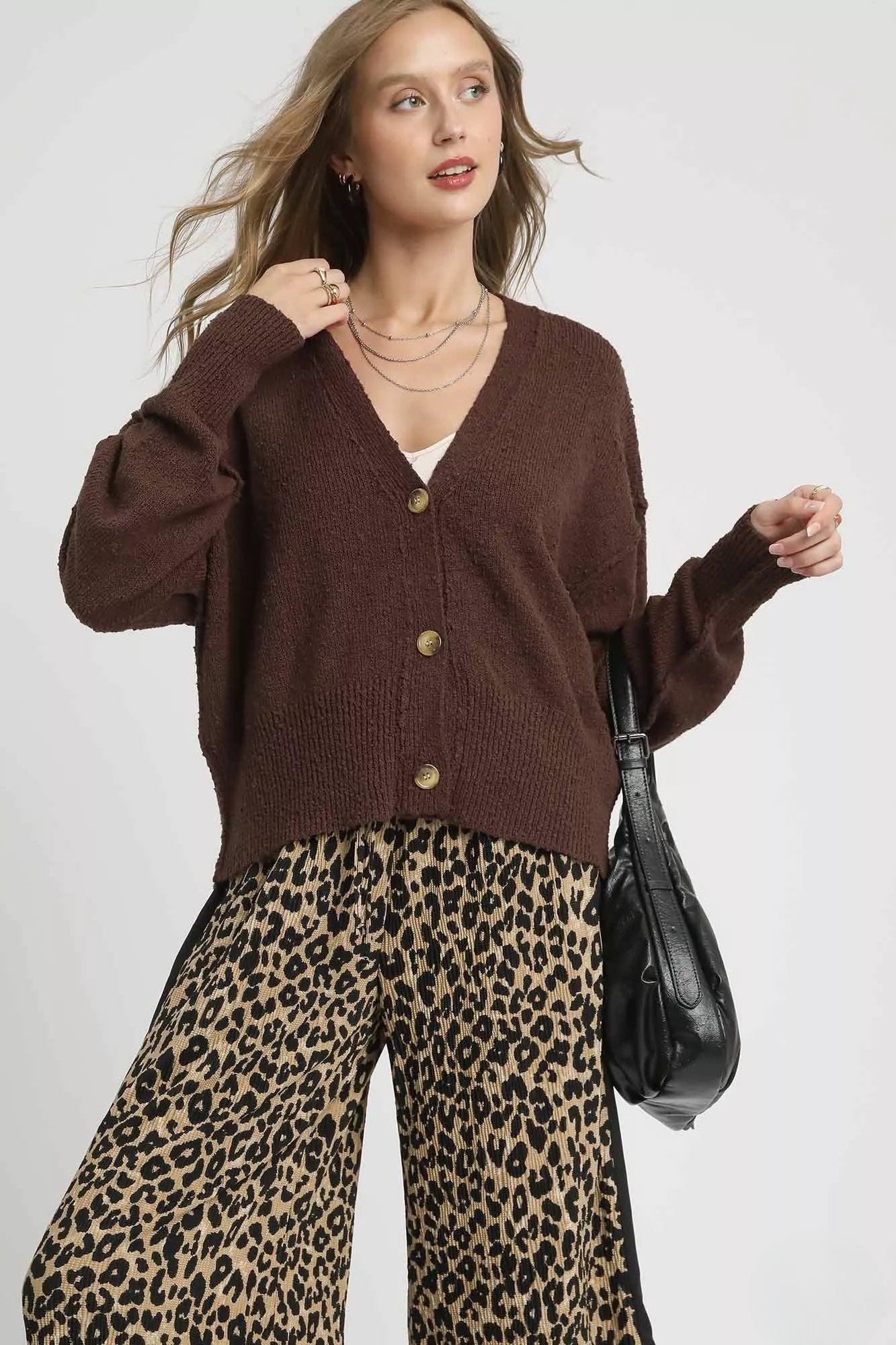 Chocolate brown oversized knit cardigan with V neckline, button front and long sleeves