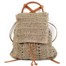 AVAH-closeup of dark khaki woven crochet backpack with brown leather straps front view