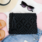 Black Macrame Woven Clutch with tassel accent and zip closure and inside lining
